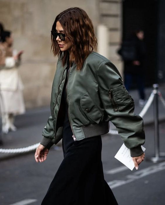 Green Bomber Jacket paired with dress